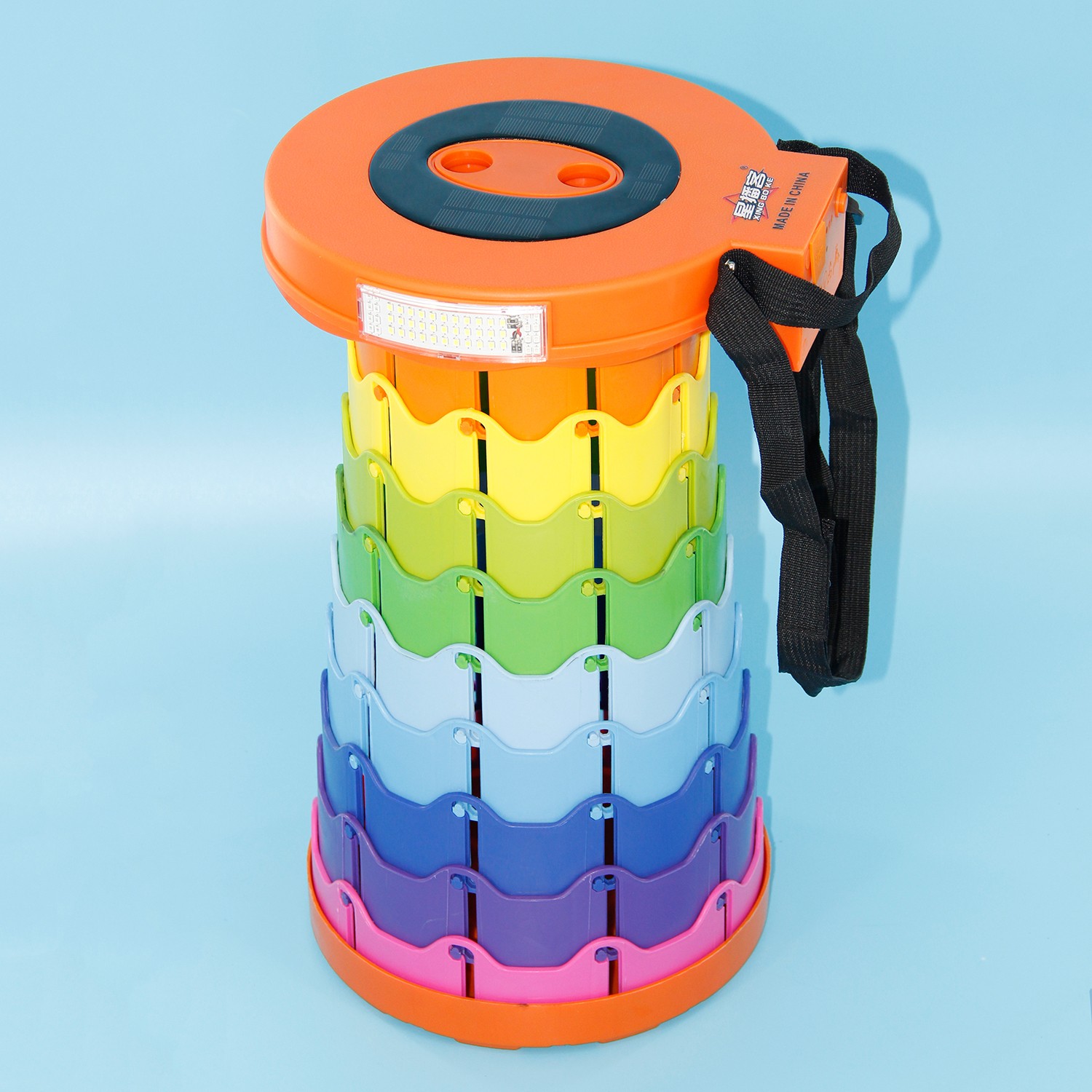 The portable rainbow stool can be directly charged by solar energy, and it also comes with a Bluetooth speaker!