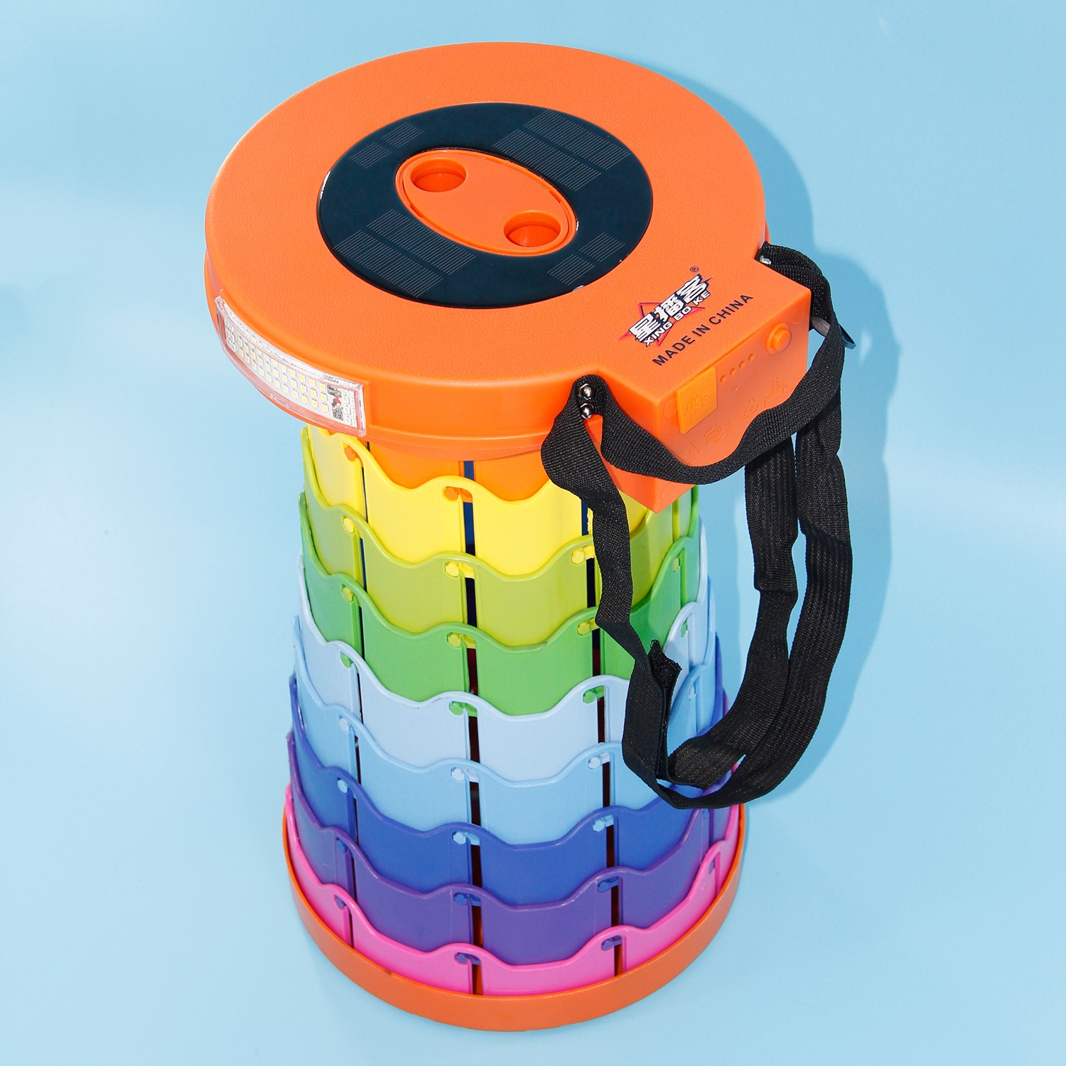 The portable rainbow stool can be directly charged by solar energy, and it also comes with a Bluetooth speaker!